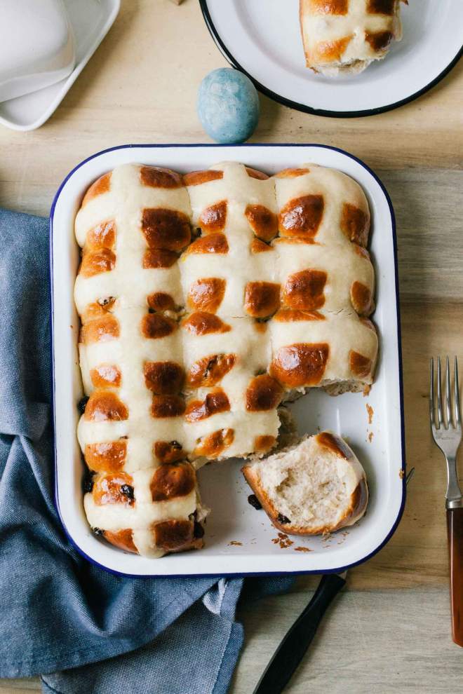 Baked hot cross buns served in a baking dish