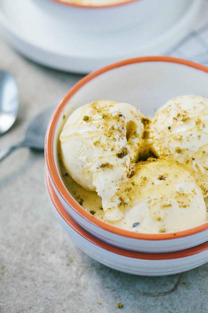 No-churn lemon and mascarpone ice cream served in a bowl with honey