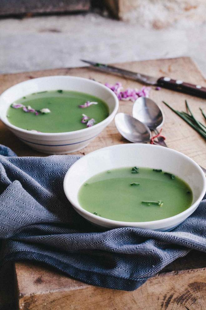 Nettle soup with chives served in a bowl