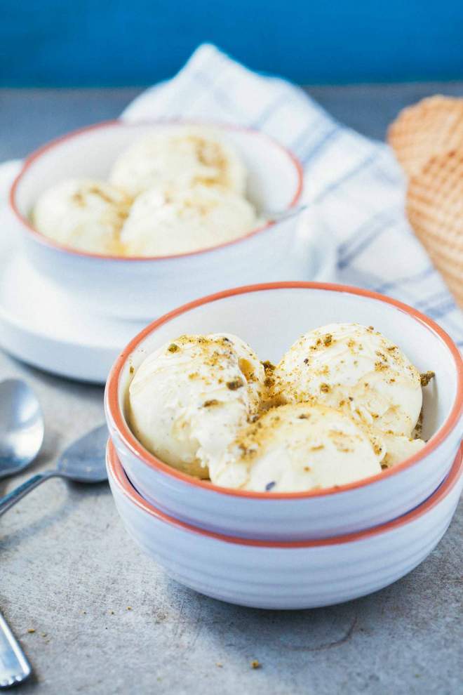 No-churn lemon and mascarpone ice cream served in a bowl with honey