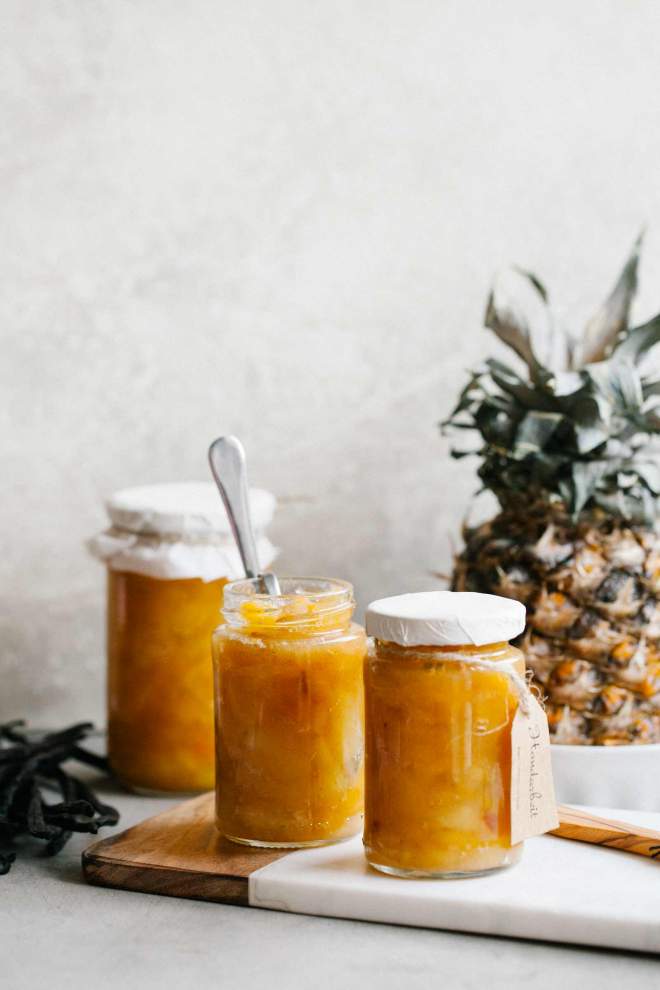 Pineapple jam with mango and persimmon in a jar