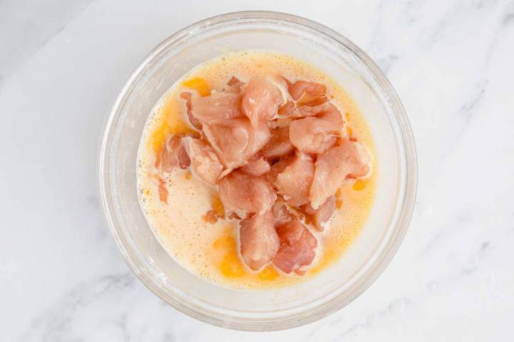 Preparing chicken for Sweet and Sour Chicken with Pineapple