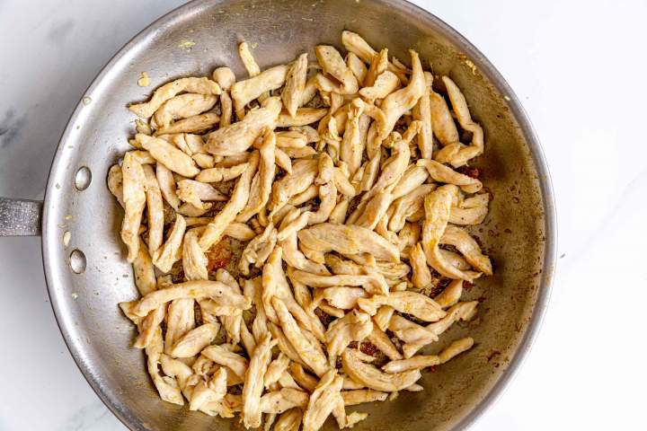 Pan-frying chicken for Creamy Chicken with Asparagus