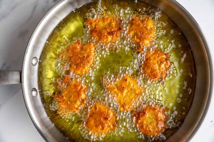 Frying Carrot Fritters (Pakora)