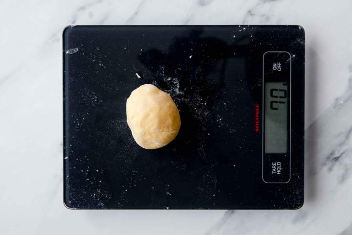 Weighing Berliner Doughnut with Jam