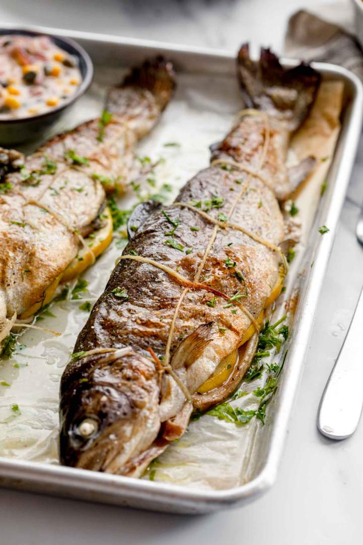 Baked rainbow trout with butter sauce