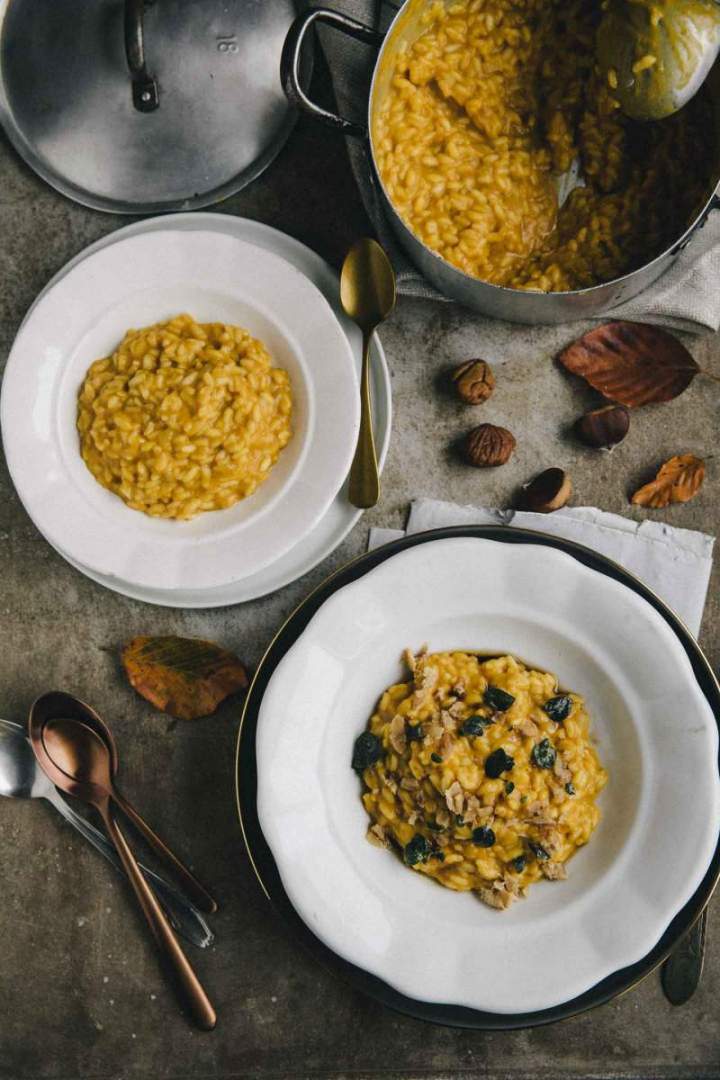 Chestnut and squash risotto served in a bowl with crispy sage