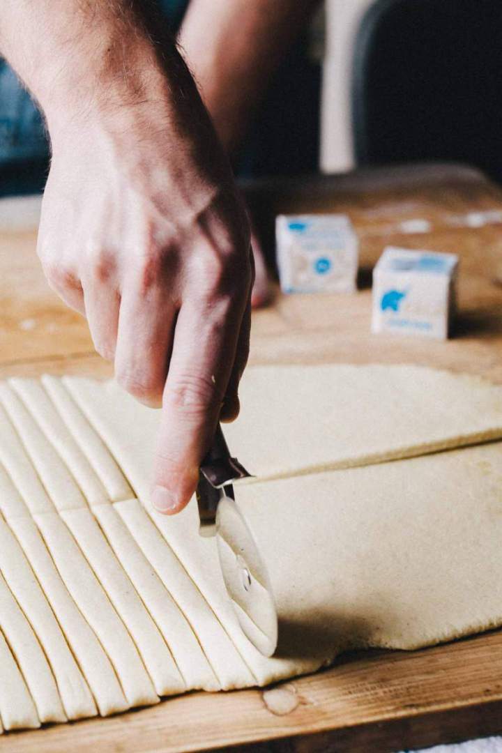 Cutting the pieces out of the Corn and Parmesan cheese grissini dough