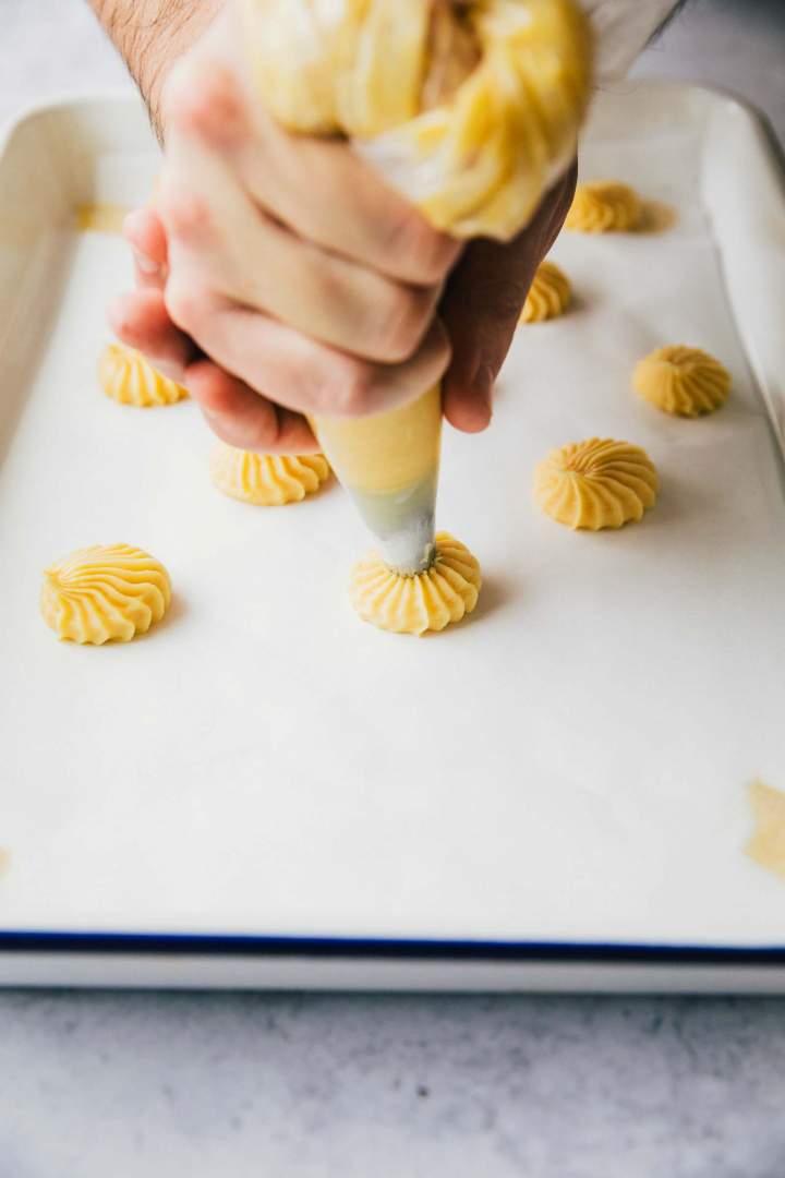 Cream Puffs (Choux au Craquelin) with vanilla cream