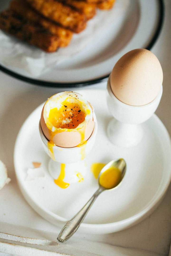 Dippy eggs and savory french toast served for breakfast