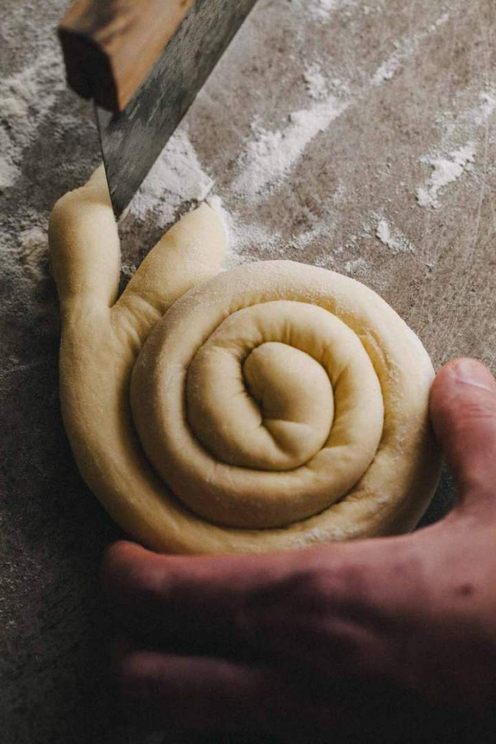 Shaping Easter bunny shaped rolls