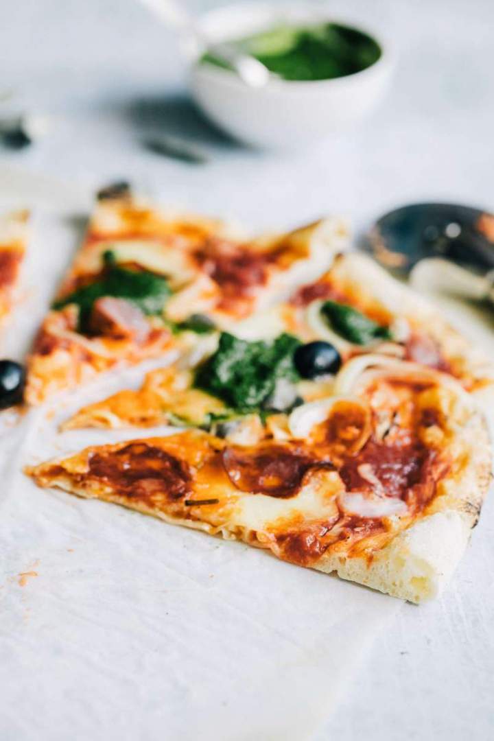 Fall pepperoni pizza with onion and sage