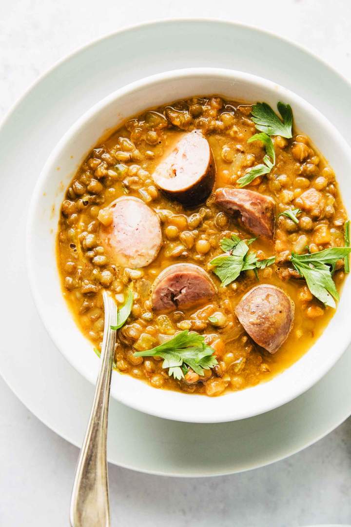 Lentil stew with indian spices and sausage