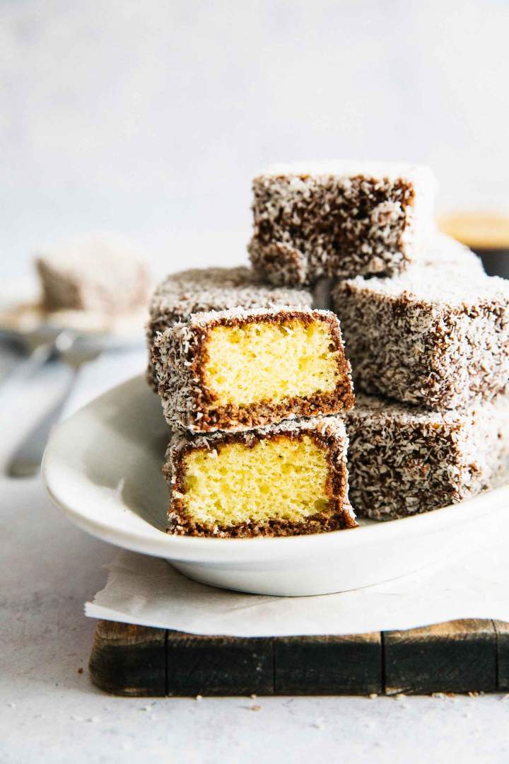 Sponge cake coated in chocolate then rolled in coconut - lamington