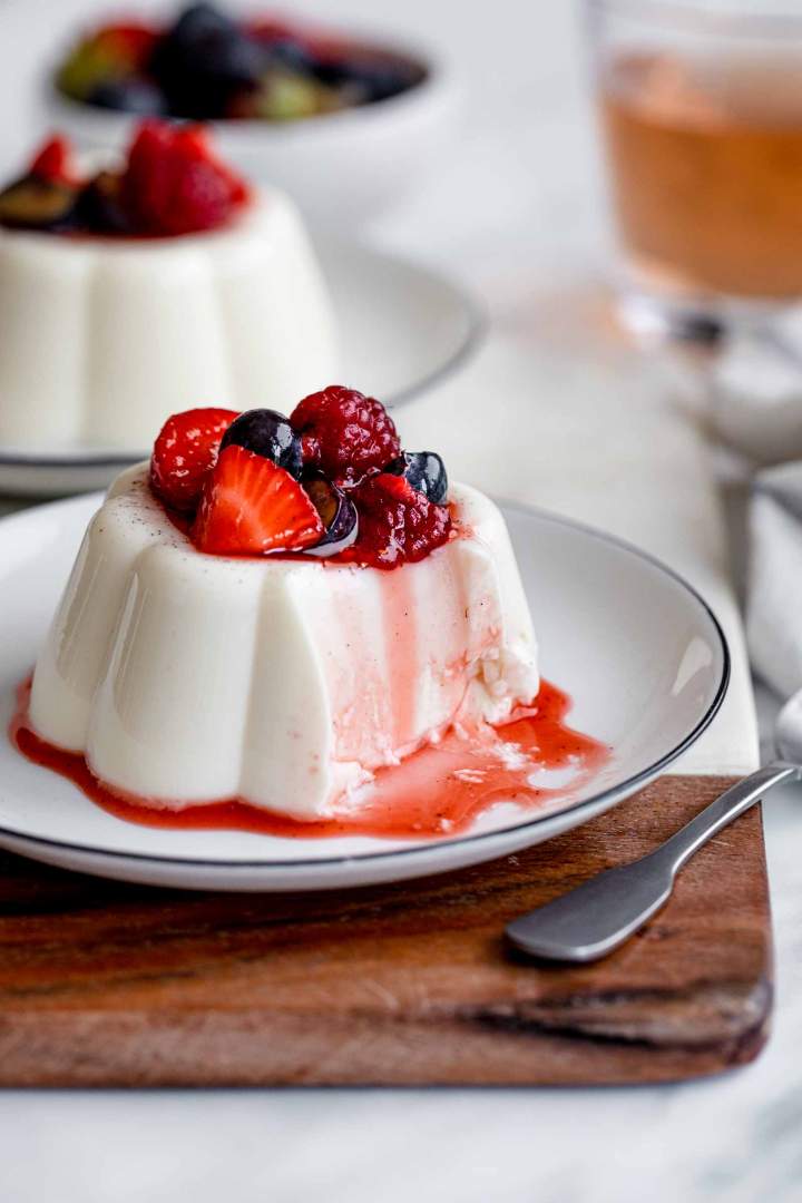 Classic Vanilla Panna Cotta served with macerated berries