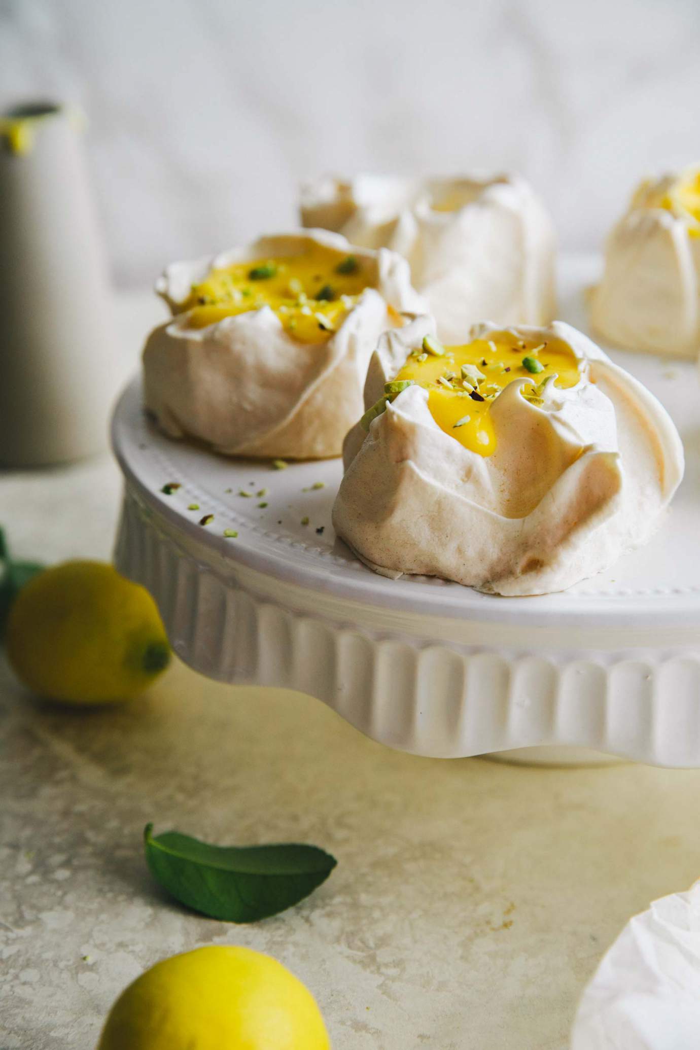Pavlova with lemon curd and pistachios