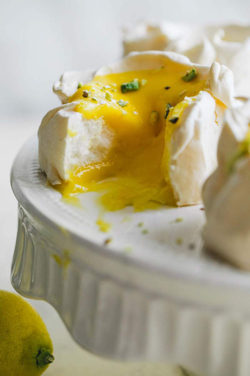 Pavlova with lemon curd and pistachios with a beautiful texture