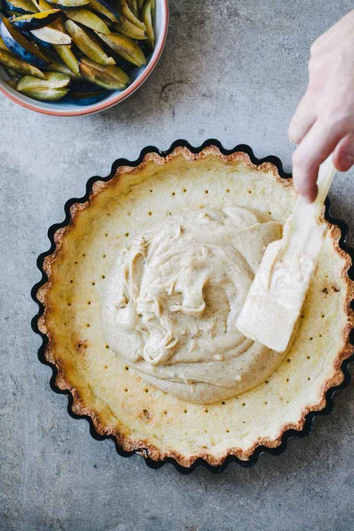 Spreading the filling over prebaked tart crust