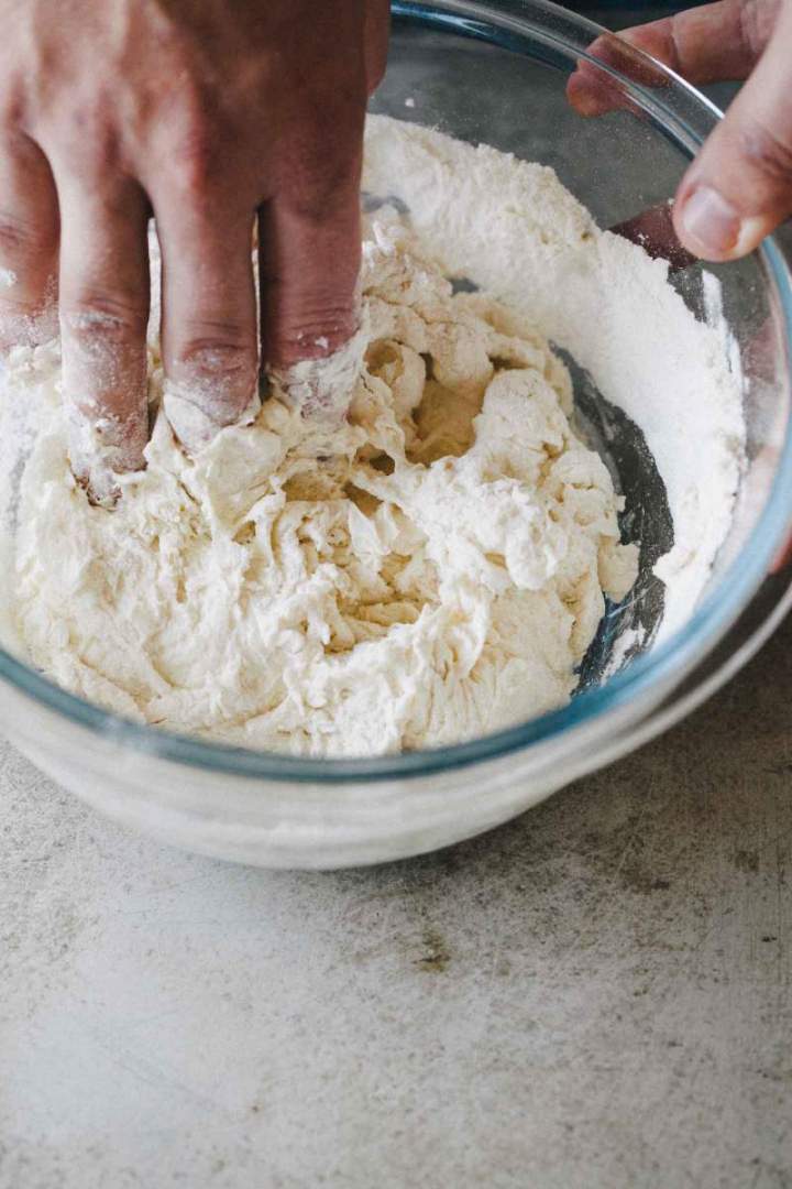 Kneading a dough for Quick pizza dough (crust)