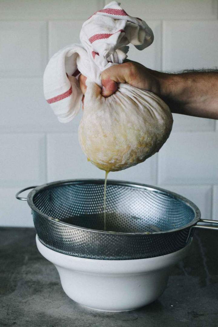 Draining water from zucchini and potatoes for Rösti (potato and zucchini fritters)