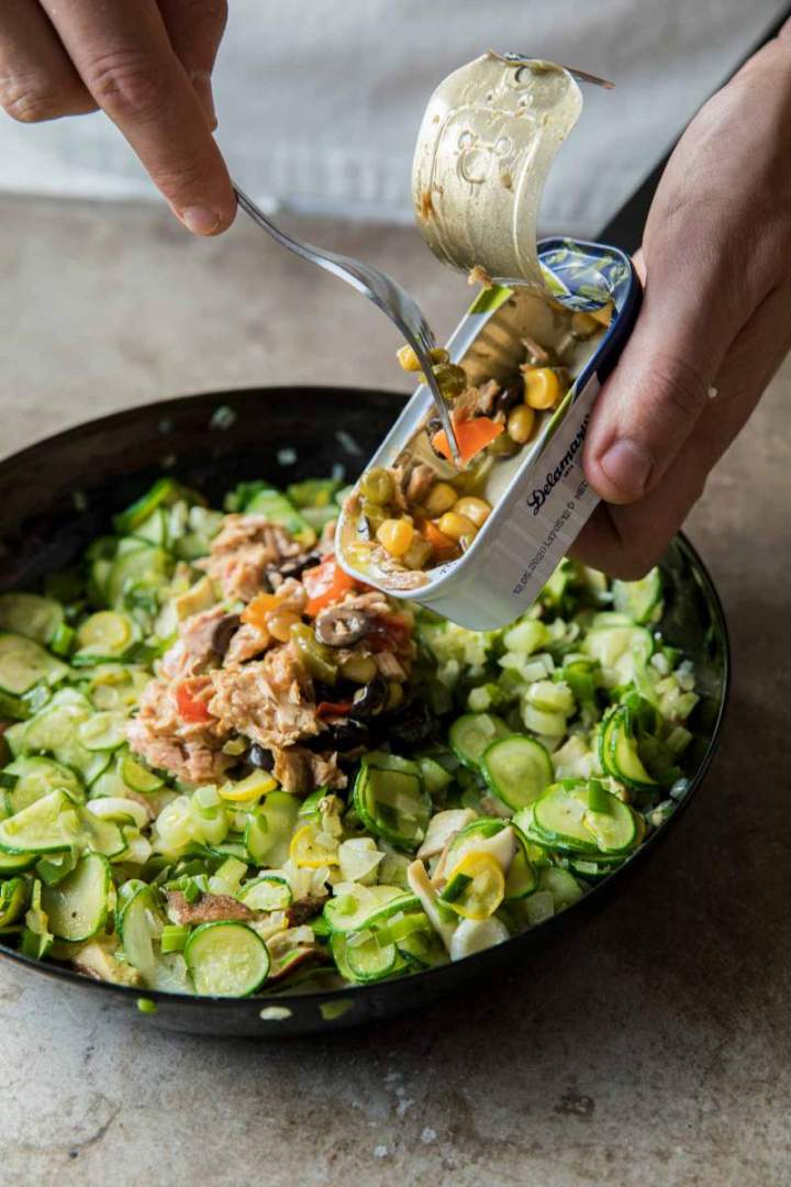 Adding tuna Mediterana to seasonal vegetables for  Seasonal Vegetables and Tuna Mediterana Tart