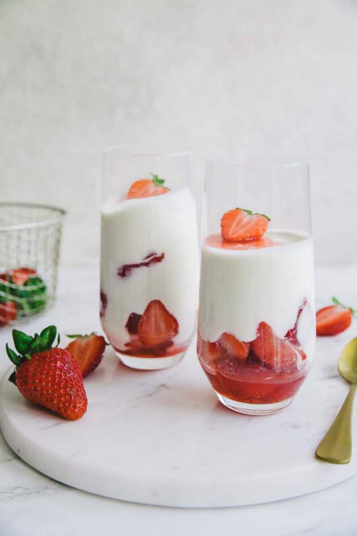 Yogurt Mousse in a glass jar with strawberries